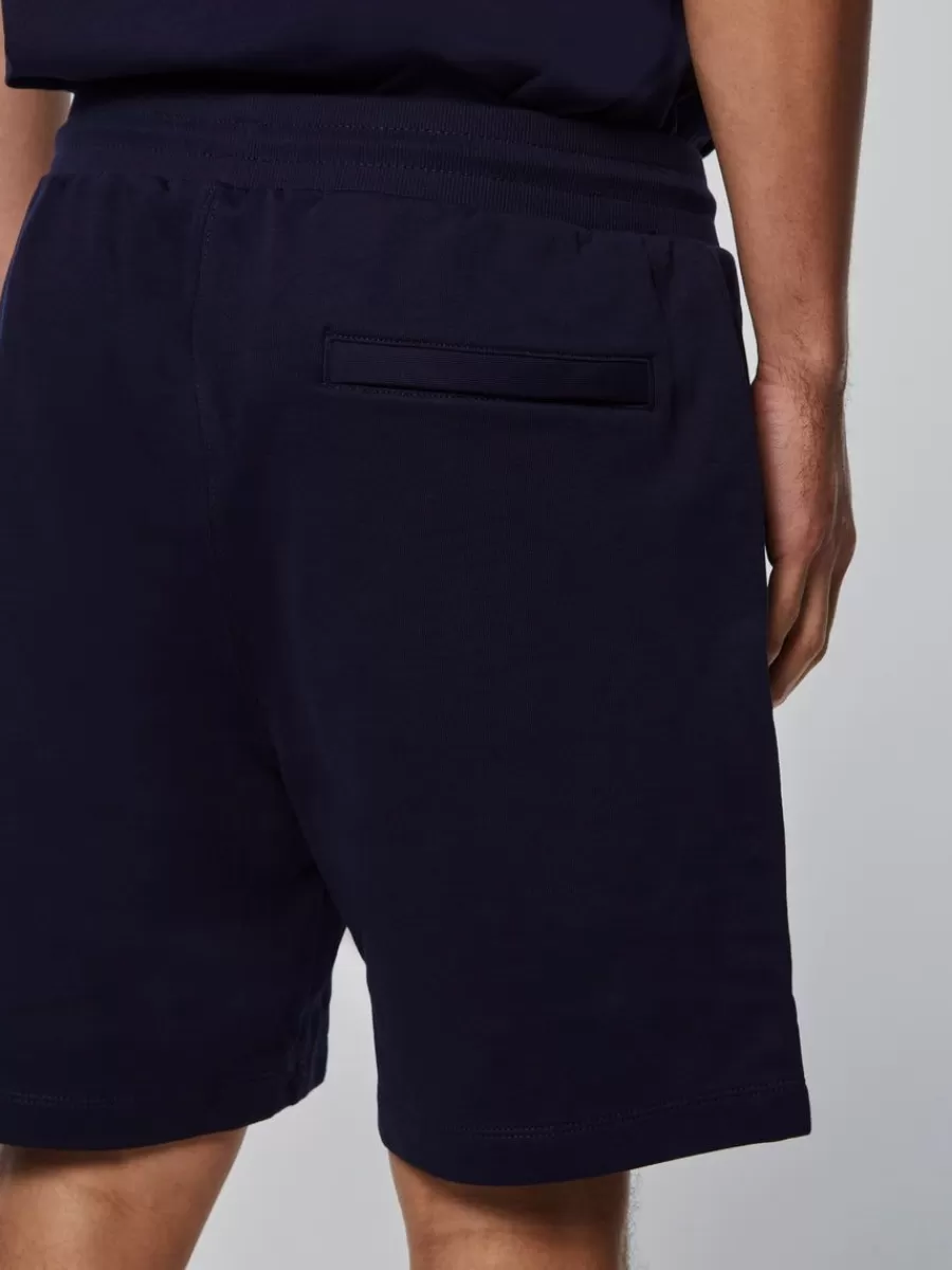 Sergio Tacchini - Pantalón Corto Heritage de la Colección Clásica en Azul Marino con Detalle de Logo Icónico
